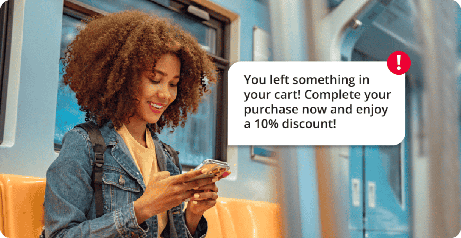 Girl getting text reminder of shopping cart